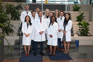 Dr. Ghannam standing with other fellows.