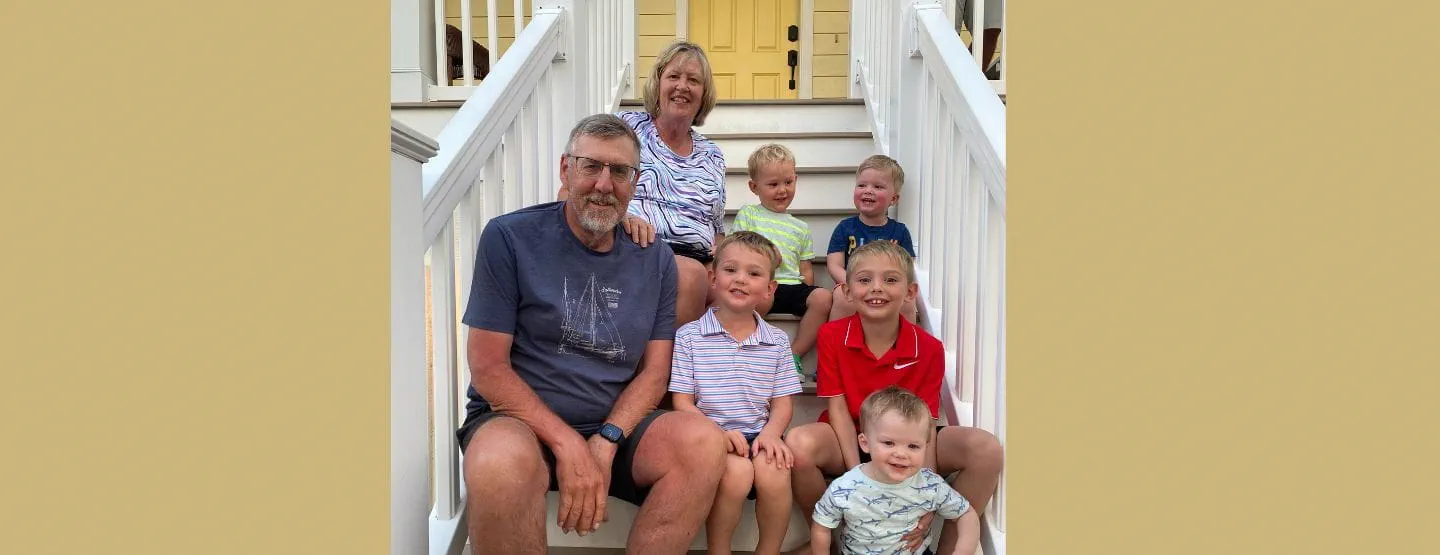 Roy Brandes with his wife and five grandsons.