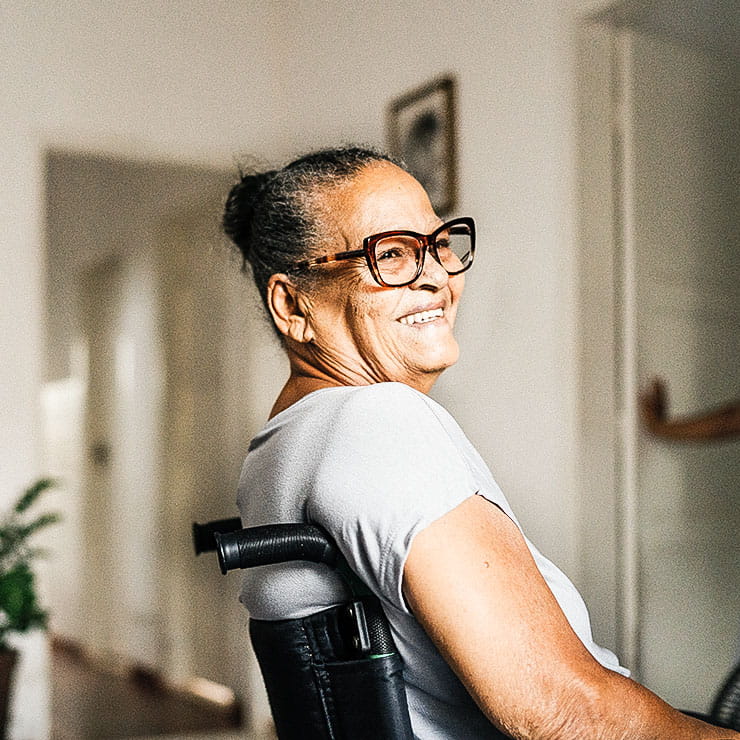 Woman in wheelchair smiling